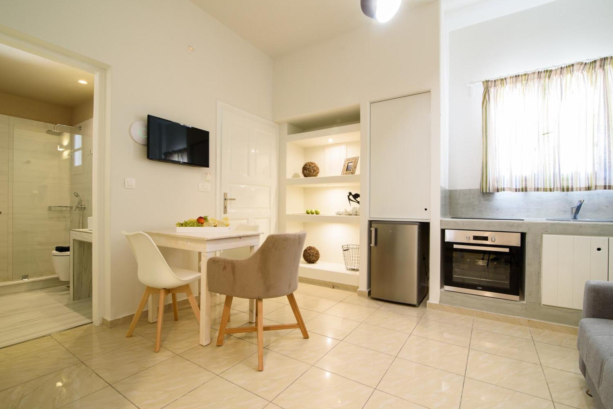 De_Naxia Suites Períssa Chambre photo